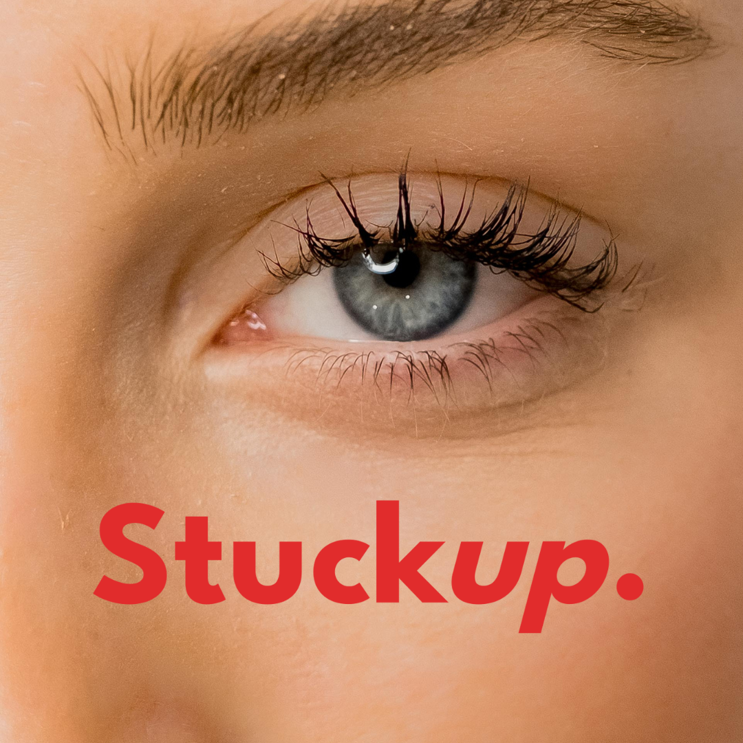 The image promotes Stuckup Eyelid Corrector, offering an invisible, non-surgical eyelid lift for hooded eyes, monolids, and deep-set eyes. Provides long-lasting, natural lift with sweatproof and waterproof wear.